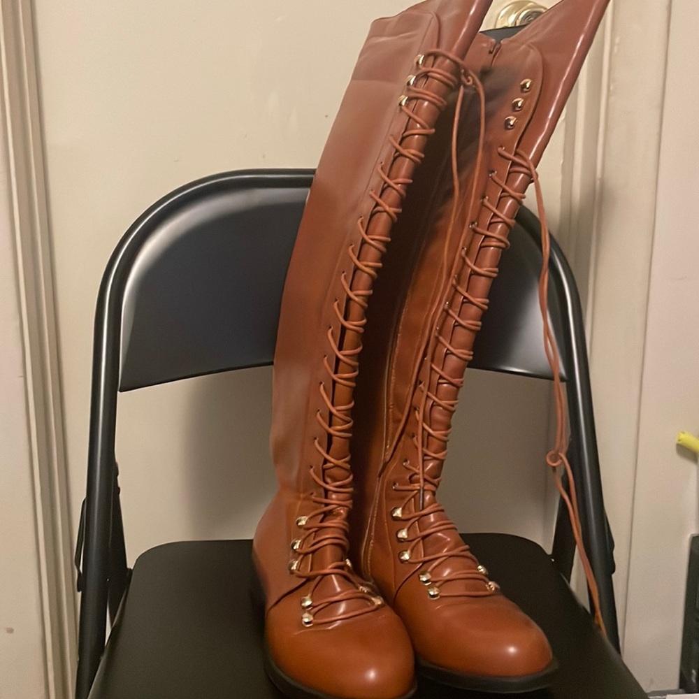 Brown lace up boots to knees, casual boot great for up coming fall weather